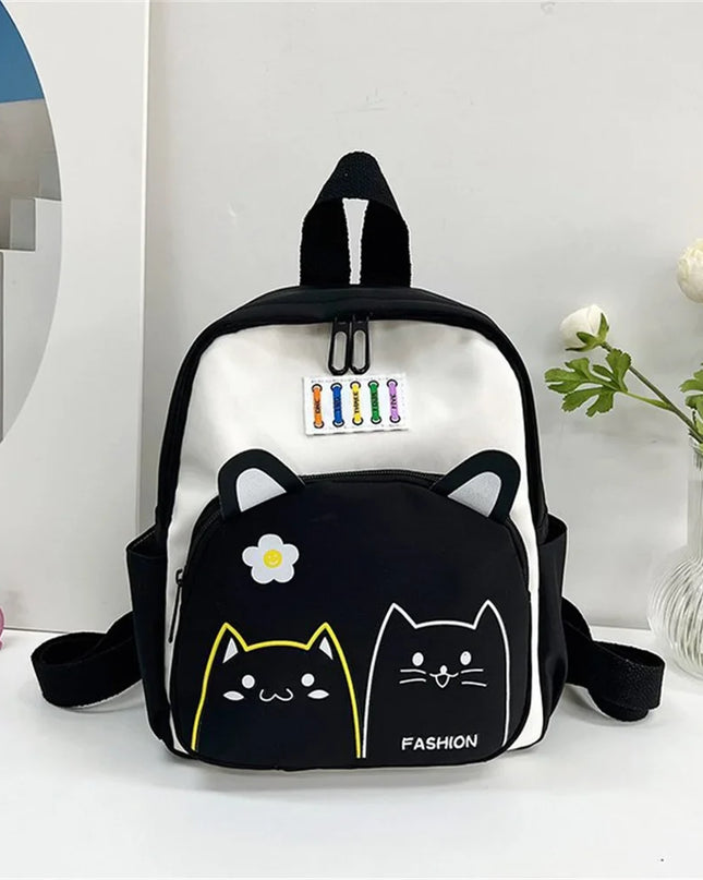 Schwarz-weißer Kita Rucksack mit Katzenmotiv - für Mädchen